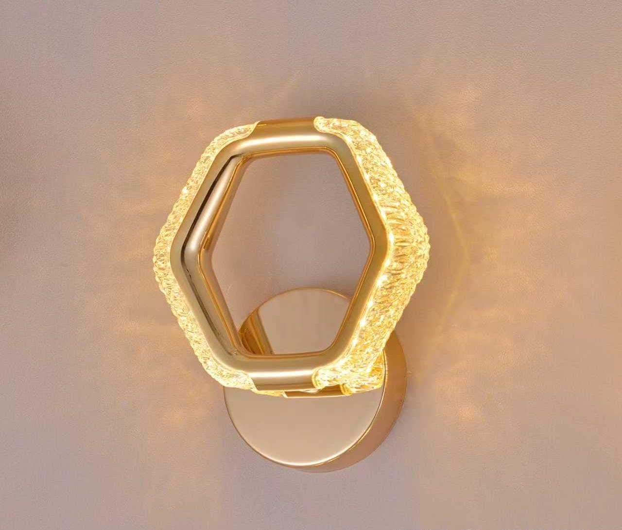 Decorative Gold LED Wall Sconce with Star Effect Glow. - View 1